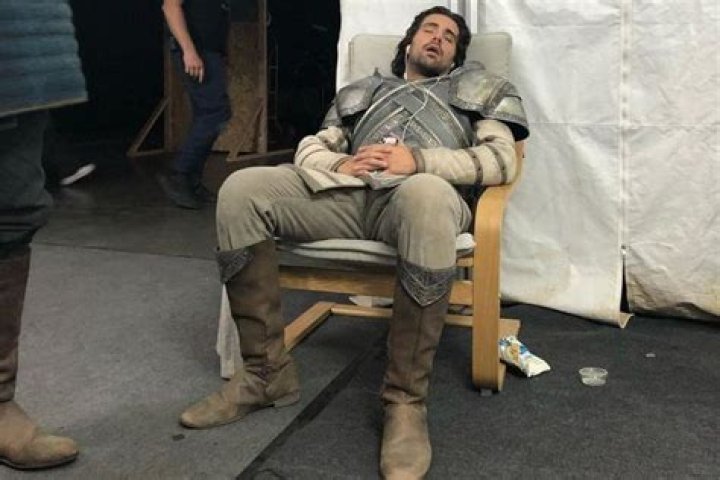 
HOTD’s Fabien Frankel Jokes He’s an ‘Ugly Sleeper’ After Costar Snaps Photo of Him Snoozing in Costume 