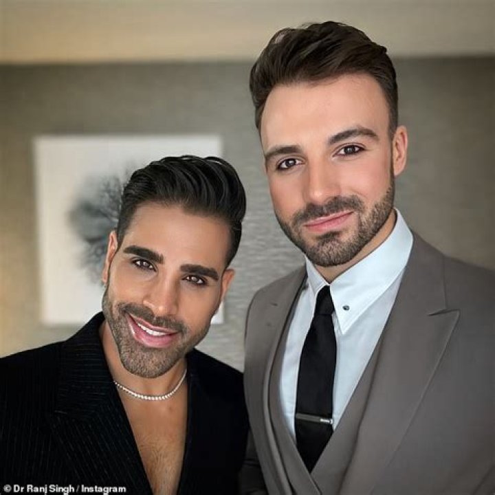 
Is Dr Ranj Singh Dating A Gay Partner? Sexuality Explored – Where Is Wife Sulvinder Samra Now? 